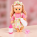 Păpușică blondă cu accesorii roz pastel